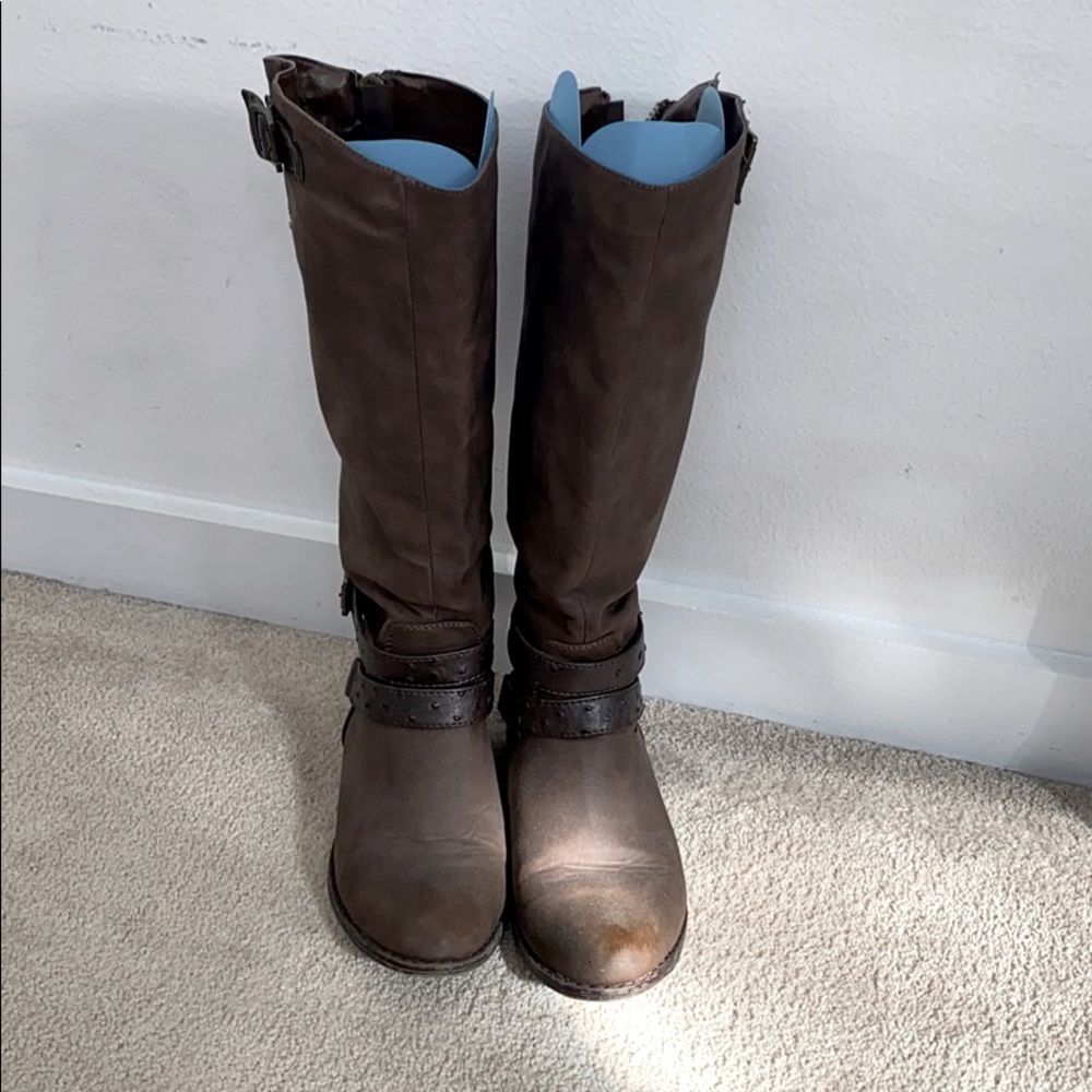 Zip up leather boots.